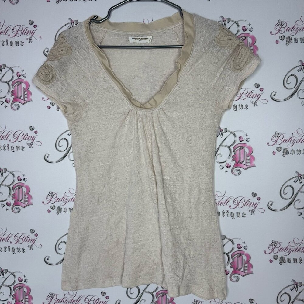 Pilcro and the letterpress tshirt floral design on shoulders distressed collar